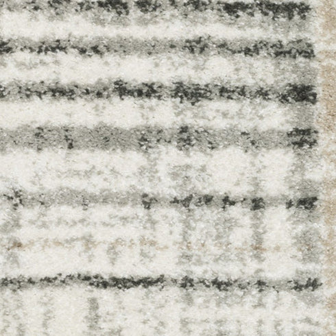 3' X 5' Grey Charcoal Ivory Tan Brown And Beige Geometric Power Loom Stain Resistant Area Rug